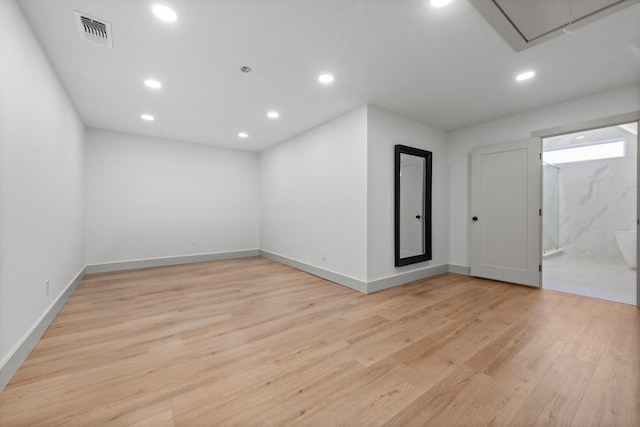 3508 Sentinel Oak Dr, Flower Mound, TX 75022 - empty room featuring light wood finished floors, visible vents, baseboards, attic access, and recessed lighting