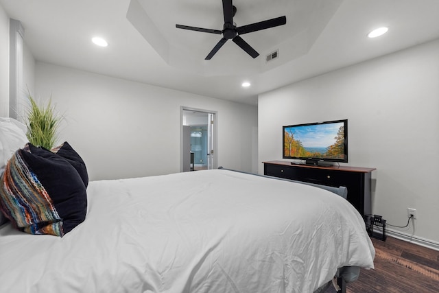 3508 Sentinel Oak Dr, Flower Mound, TX 75022 - bedroom featuring visible vents, recessed lighting, a raised ceiling, and wood finished floors