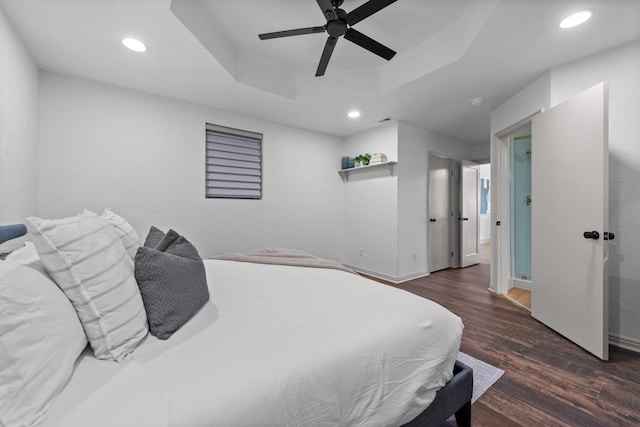 3508 Sentinel Oak Dr, Flower Mound, TX 75022 - bedroom featuring recessed lighting, a raised ceiling, and wood finished floors