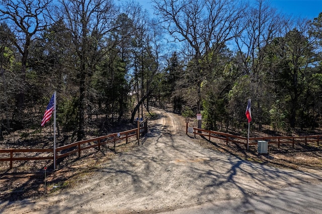 view of community with fence