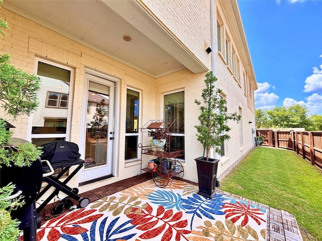 view of patio featuring fence