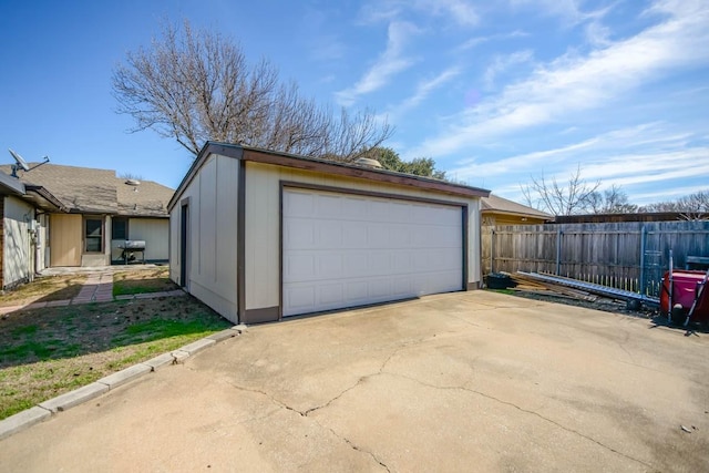 detached garage with fence