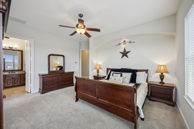 236 Rockland Trl, Lucas, TX 75002 - bedroom with light carpet, ensuite bath, a ceiling fan, a sink, and baseboards