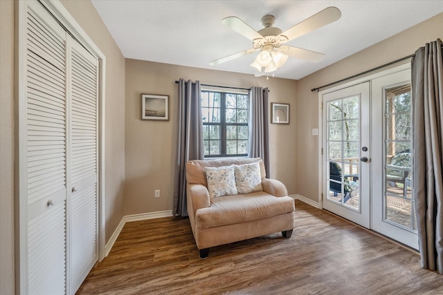 736 Wildwood Trl, Holly Lake Ranch, TX 75765 - sitting room featuring french doors, wood finished floors, and plenty of natural light