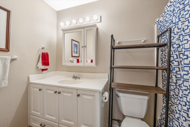 736 Wildwood Trl, Holly Lake Ranch, TX 75765 - bathroom with vanity and toilet