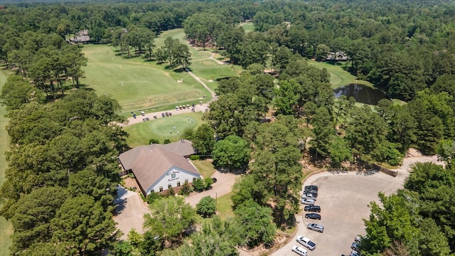 736 Wildwood Trl, Holly Lake Ranch, TX 75765 - aerial view of property's location featuring a golf course, a large body of water, and a heavily wooded area