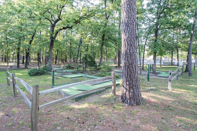 736 Wildwood Trl, Holly Lake Ranch, TX 75765 - view of yard with an area to practice putting