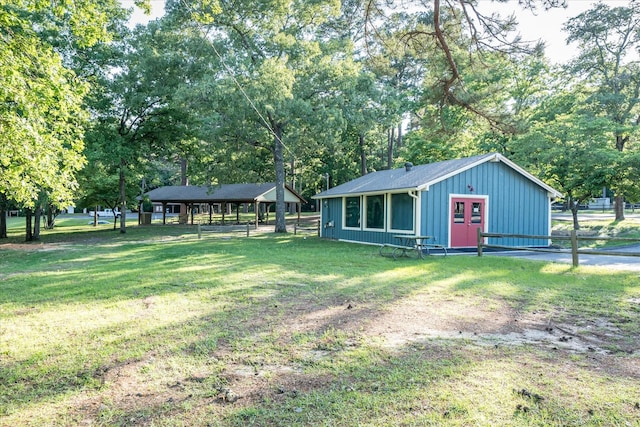 736 Wildwood Trl, Holly Lake Ranch, TX 75765 - view of grassy yard featuring view of wooded area and a gazebo