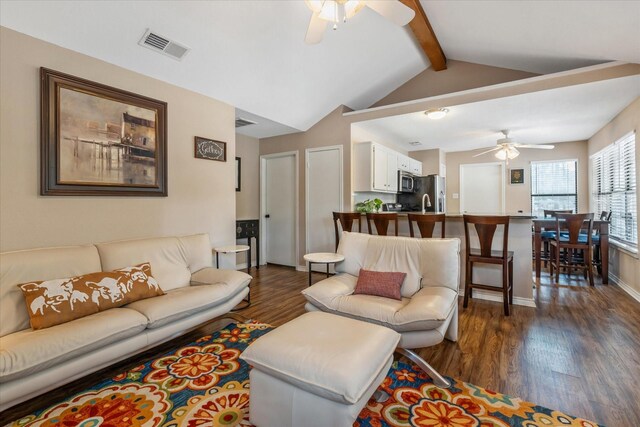 736 Wildwood Trl, Holly Lake Ranch, TX 75765 - living area with a ceiling fan, dark wood-style floors, and baseboards
