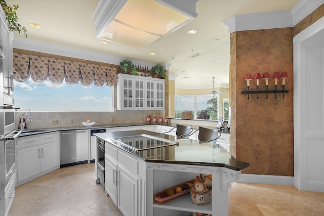 kitchen featuring tasteful backsplash, open shelves, black electric stovetop, stainless steel dishwasher, and a sink