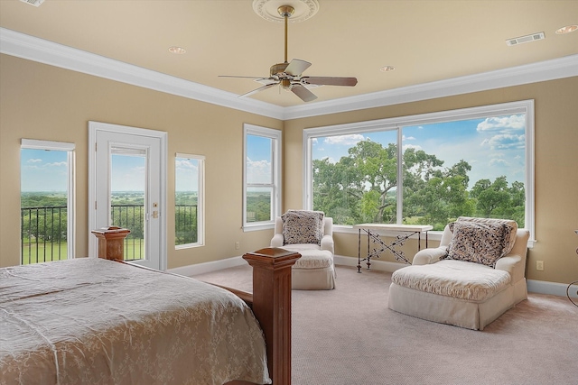 bedroom featuring baseboards, visible vents, access to exterior, light carpet, and crown molding