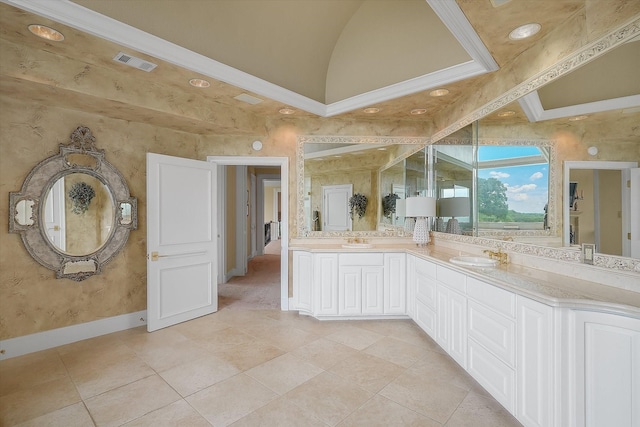 bathroom with double vanity, visible vents, tile patterned floors, and a sink