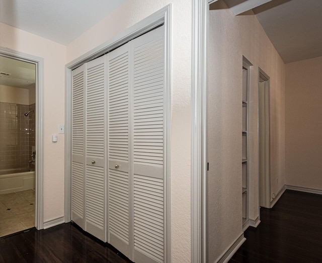 8600 Coppertowne Ln Unit 303C, Dallas, TX 75243 - hall with dark wood-style floors