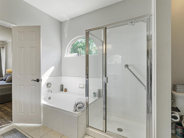 2905 Cabot Ln, Mckinney, TX 75072 - ensuite bathroom featuring a garden tub, a stall shower, and tile patterned floors