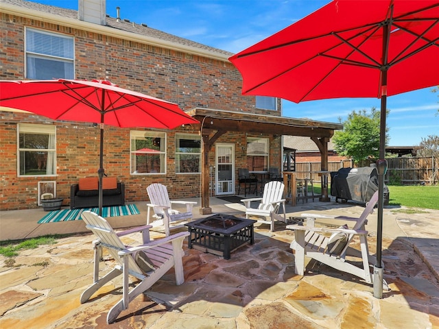 2905 Cabot Ln, Mckinney, TX 75072 - view of patio / terrace featuring an outdoor fire pit and area for grilling