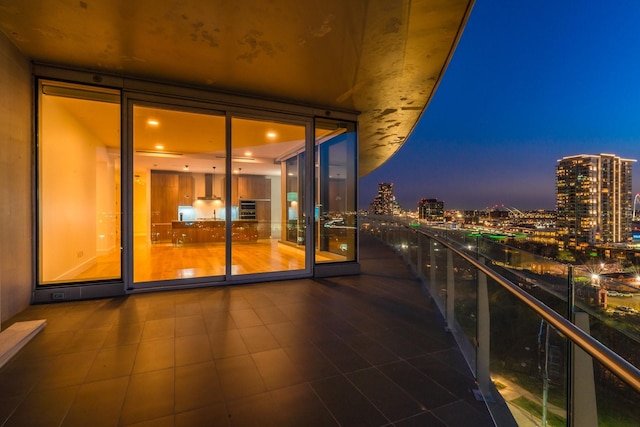 balcony at night with a view of city lights