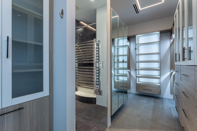 2300 Wolf St Unit 15C, Dallas, TX 75201 - interior space featuring visible vents and radiator heating unit