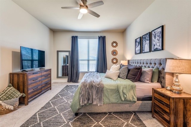 bedroom featuring a ceiling fan and carpet floors