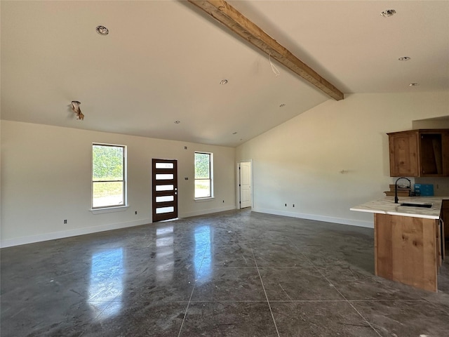 TBD5 Cowley Rd, Whitt, TX 76486 - unfurnished living room featuring baseboards and a sink