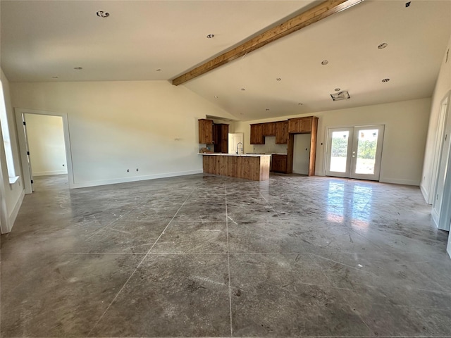 TBD5 Cowley Rd, Whitt, TX 76486 - unfurnished living room featuring baseboards and french doors