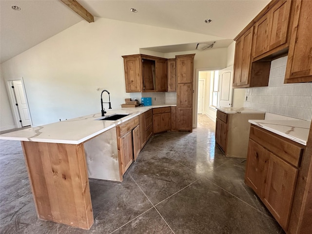 TBD5 Cowley Rd, Whitt, TX 76486 - kitchen featuring a peninsula, backsplash, brown cabinets, and light countertops