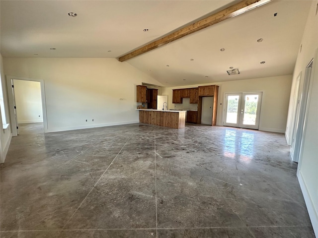 TBD5 Cowley Rd, Whitt, TX 76486 - unfurnished living room featuring baseboards and french doors