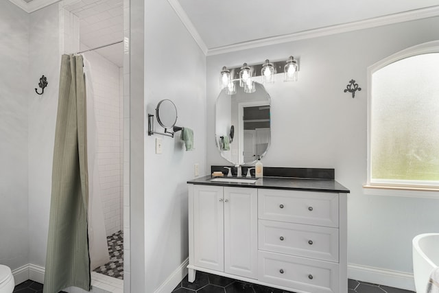 bathroom with baseboards, tiled shower, vanity, and crown molding