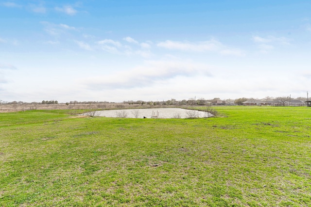 view of yard with a water view