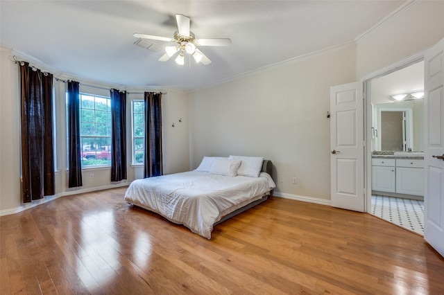 9005 Crown Point Cir, Irving, TX 75063 - bedroom with light wood-type flooring, ornamental molding, baseboards, and a ceiling fan