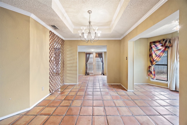 interior space with baseboards, visible vents, an inviting chandelier, a tray ceiling, and a textured ceiling
