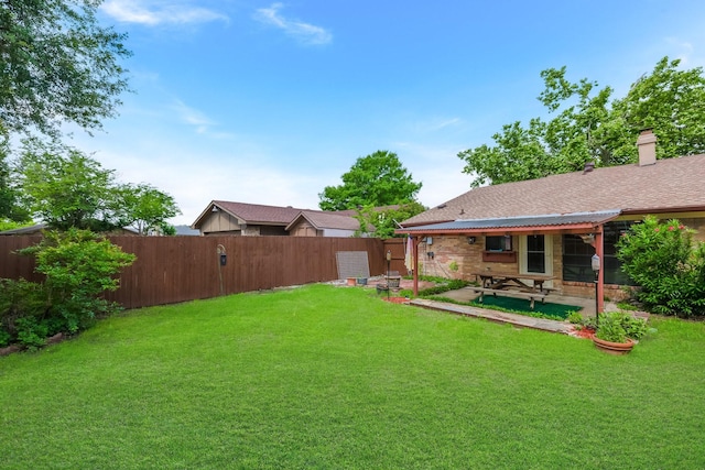 1318 Westpark Dr, Garland, TX 75040 - view of yard featuring a patio area