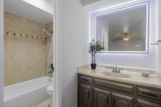 1318 Westpark Dr, Garland, TX 75040 - full bathroom with vanity, bathing tub / shower combination, toilet, and a ceiling fan