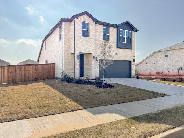 view of front of home featuring driveway, fence, a front yard, an attached garage, and brick siding