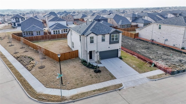 drone / aerial view featuring a residential view