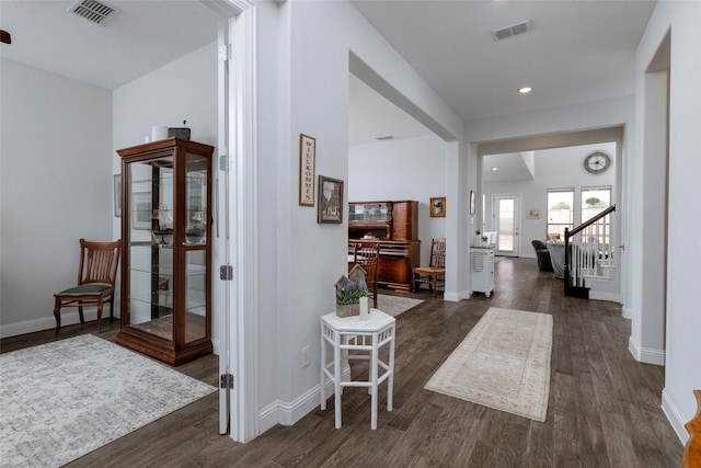 1628 Eleanor Dr, Fort Worth, TX 76052 - corridor with dark wood-style floors, baseboards, stairway, and recessed lighting