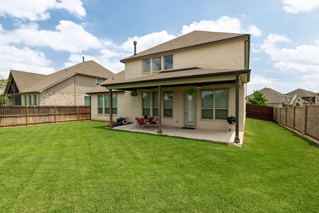 1628 Eleanor Dr, Fort Worth, TX 76052 - rear view of property featuring a patio, brick siding, and roof with shingles