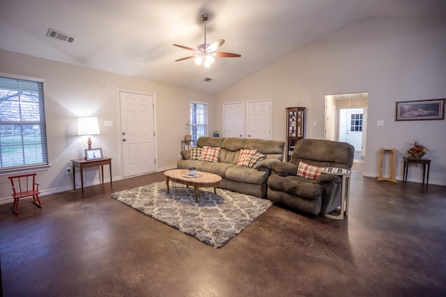 living area with visible vents, high vaulted ceiling, a ceiling fan, baseboards, and concrete flooring