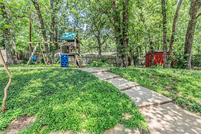 3805 Hastings Dr, Arlington, TX 76013 - view of yard featuring a storage shed and a playground
