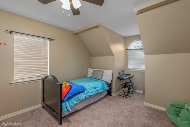 5706 Lake Side Dr, Bossier City, LA 71111 - carpeted bedroom featuring baseboards, lofted ceiling, and ceiling fan