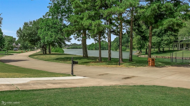 5706 Lake Side Dr, Bossier City, LA 71111 - view of home's community with a yard and a water view