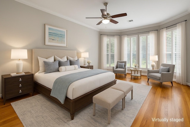 6976 Valley Brook Dr, Frisco, TX 75035 - bedroom with ornamental molding, multiple windows, light wood-style flooring, and baseboards