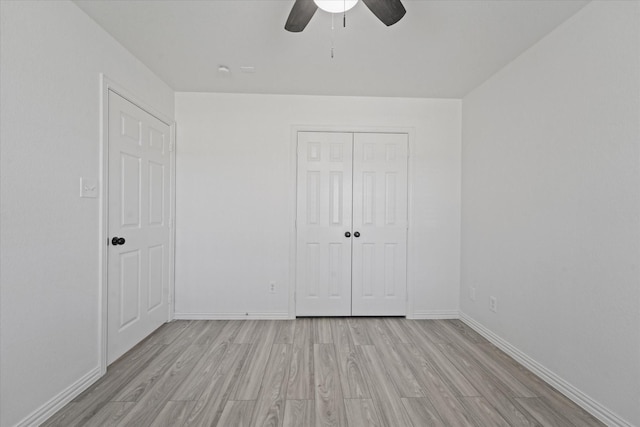14514 Seagoville Rd, Dallas, TX 75253 - unfurnished bedroom with a closet, light wood-type flooring, and baseboards