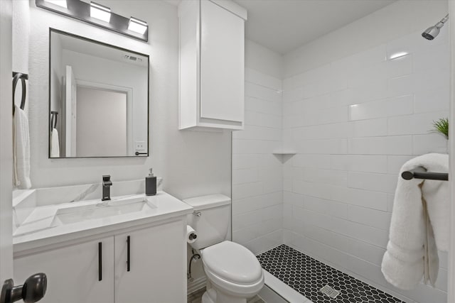 14514 Seagoville Rd, Dallas, TX 75253 - full bath featuring toilet, tiled shower, and vanity
