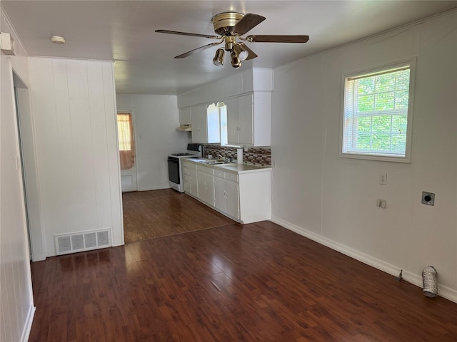 2608 N Hickory St, Sherman, TX 75092 - kitchen featuring white range with gas cooktop, dark wood-style flooring, a ceiling fan, and white cabinets