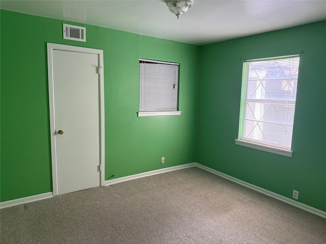 2608 N Hickory St, Sherman, TX 75092 - carpeted spare room featuring baseboards