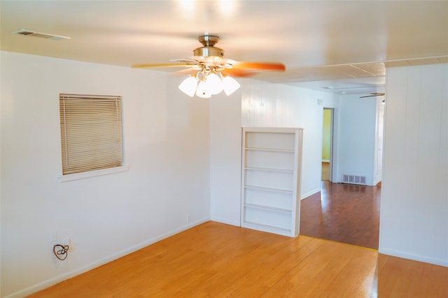 2608 N Hickory St, Sherman, TX 75092 - spare room featuring ceiling fan and wood finished floors
