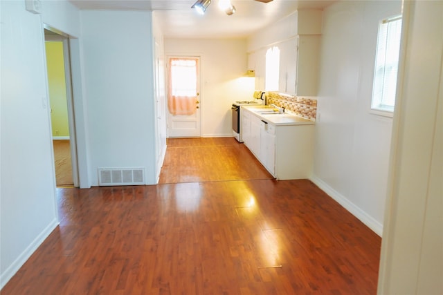 2608 N Hickory St, Sherman, TX 75092 - corridor featuring wood finished floors and healthy amount of natural light