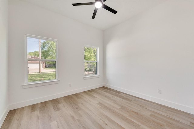 4515 Eutopia St, Greenville, TX 75401 - unfurnished room featuring light wood-style floors, baseboards, and ceiling fan