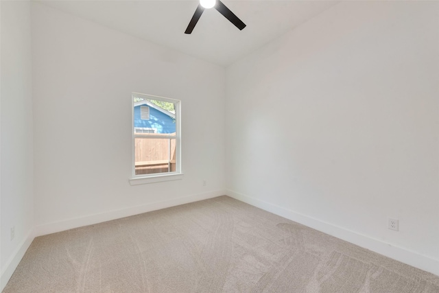 4515 Eutopia St, Greenville, TX 75401 - unfurnished room with light colored carpet, baseboards, and ceiling fan