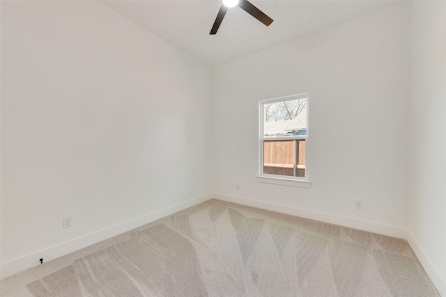4515 Eutopia St, Greenville, TX 75401 - spare room featuring baseboards, ceiling fan, and light colored carpet